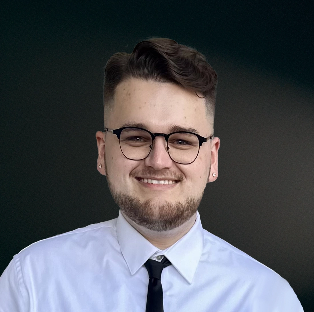 Portrait photo of Owen Denesuik, owner of OWL Creative Company and Graphic Designer.